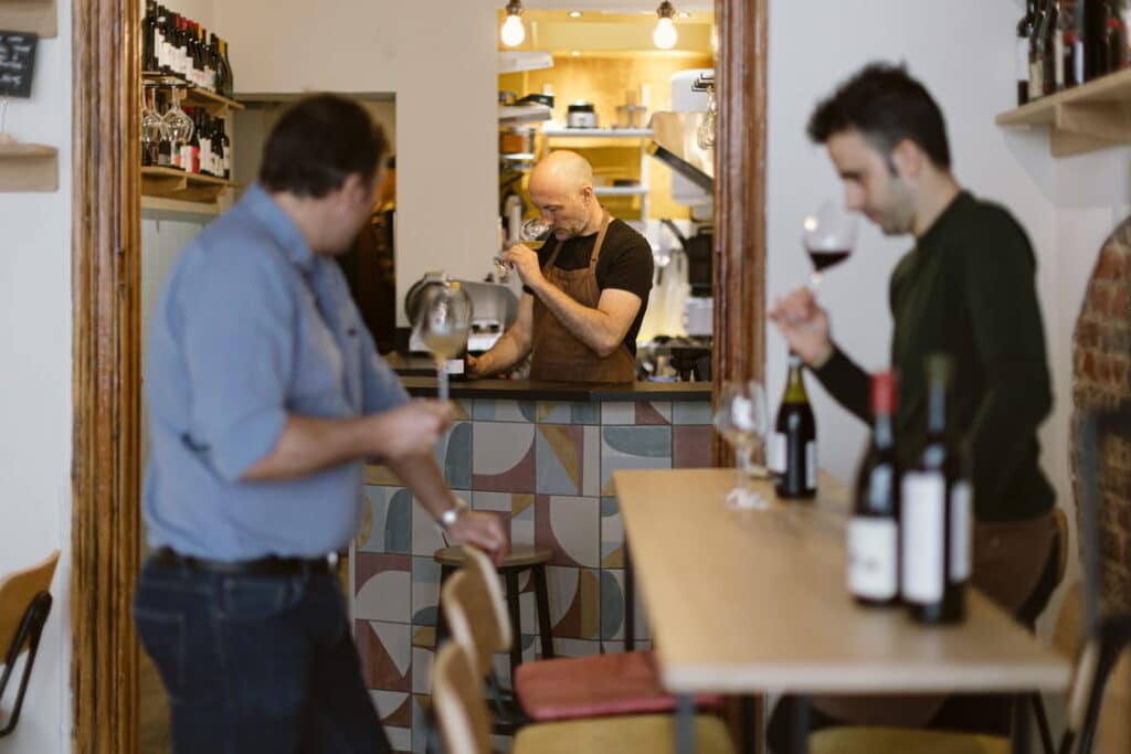 Locals tasting red wine at a Bodega in Spain